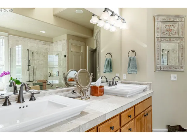 a bathroom with a bathtub and a sink