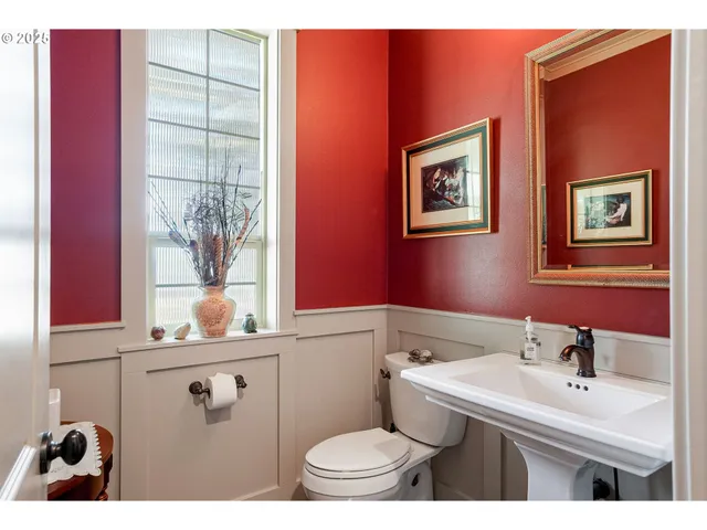 a view of staircase with white walls and a floor to ceiling window