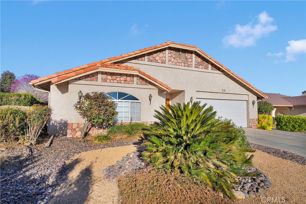12920 Rain Shadow Road Victorville, CA 92395 - Photo 1 of 1 a view of a house with a yard