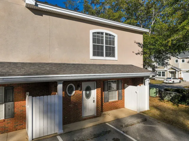a front view of a house with glass windows