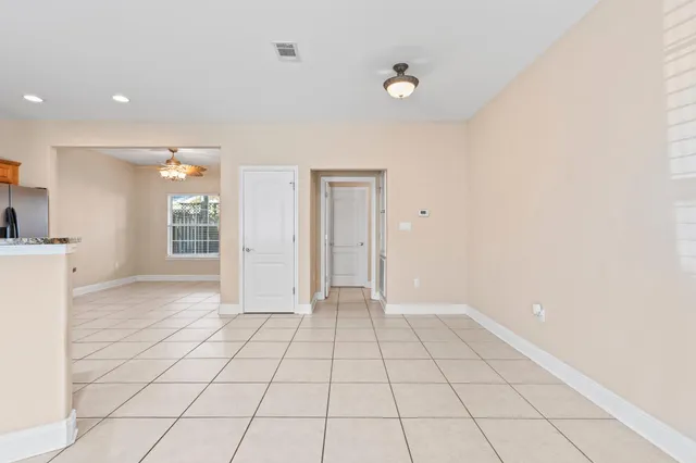 a view of an empty room and window