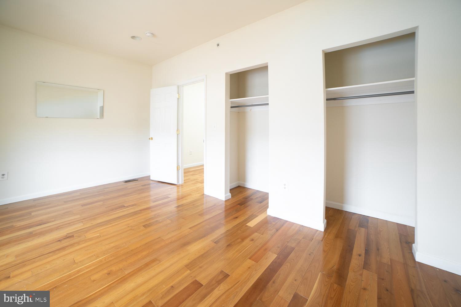 1830 North 16th Street, Unit 2 Philadelphia, PA 19121 - Photo 19 of 19 a view of empty room with wooden floor