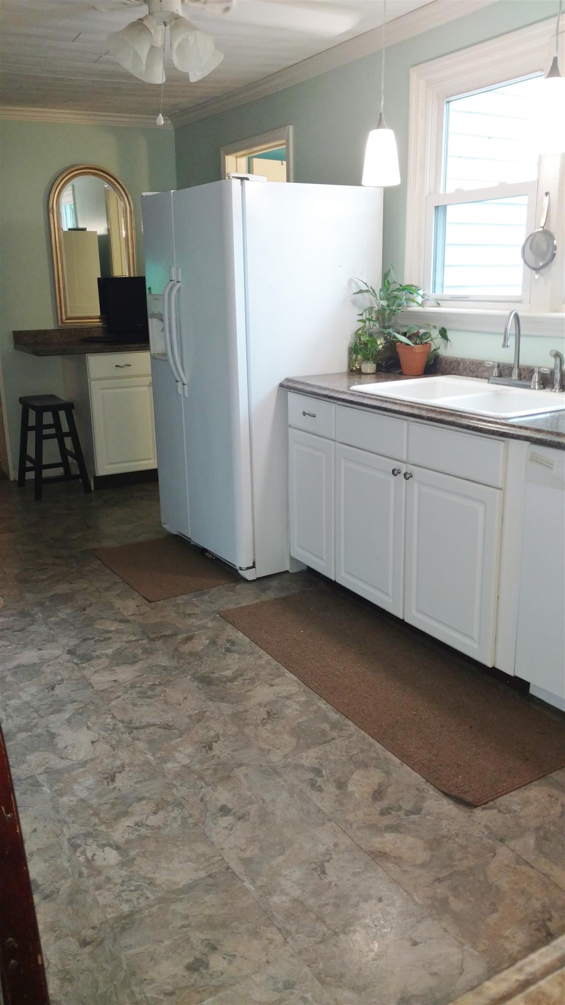 3661 Armstrong Road Springfield, TN 37172 - Photo 5 of 19 a kitchen with cabinets and window