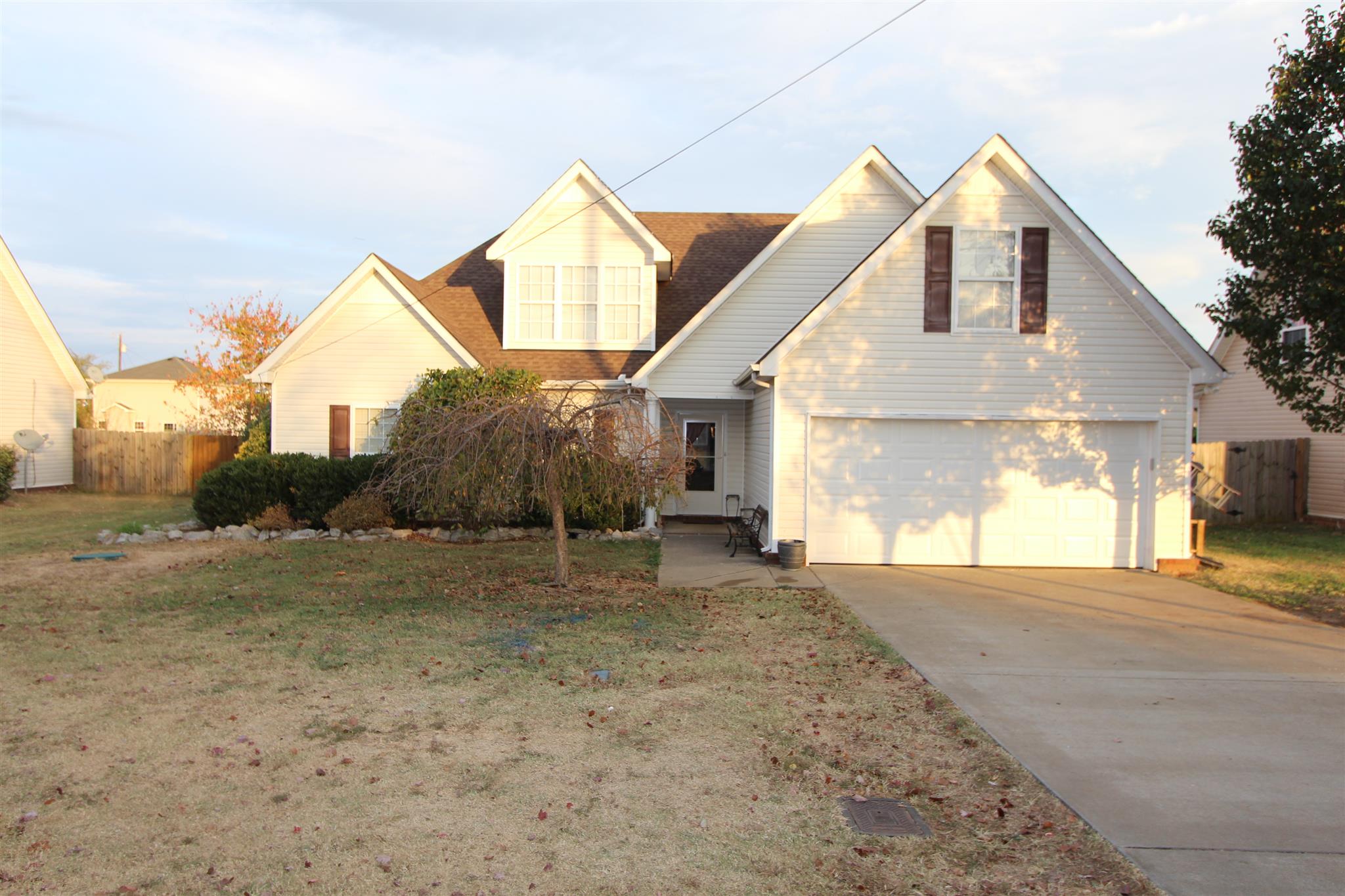 677 Crescent Road Murfreesboro, TN 37128 - Photo 1 of 15 a view of a house with a yard and garage