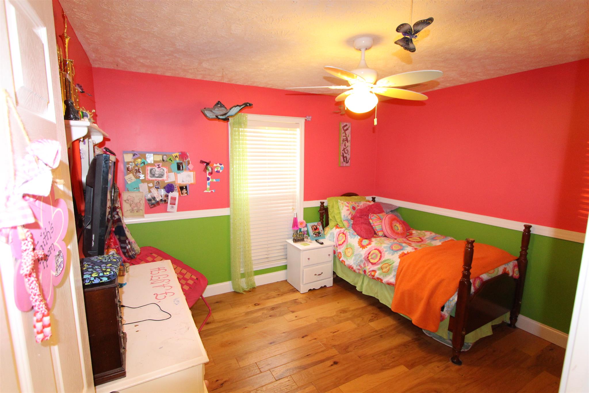 677 Crescent Road Murfreesboro, TN 37128 - Photo 12 of 15 a bedroom with a bed and a chandelier
