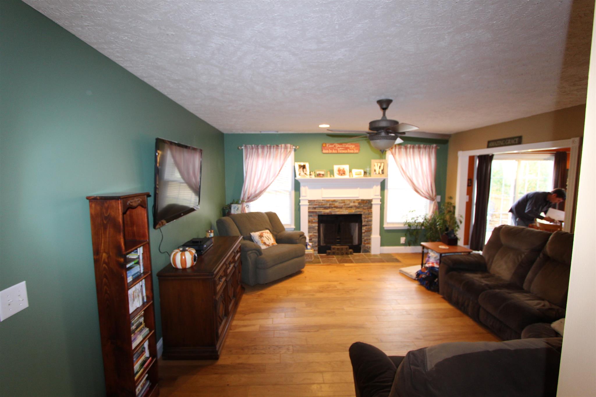 677 Crescent Road Murfreesboro, TN 37128 - Photo 3 of 15 a living room with furniture and a fireplace