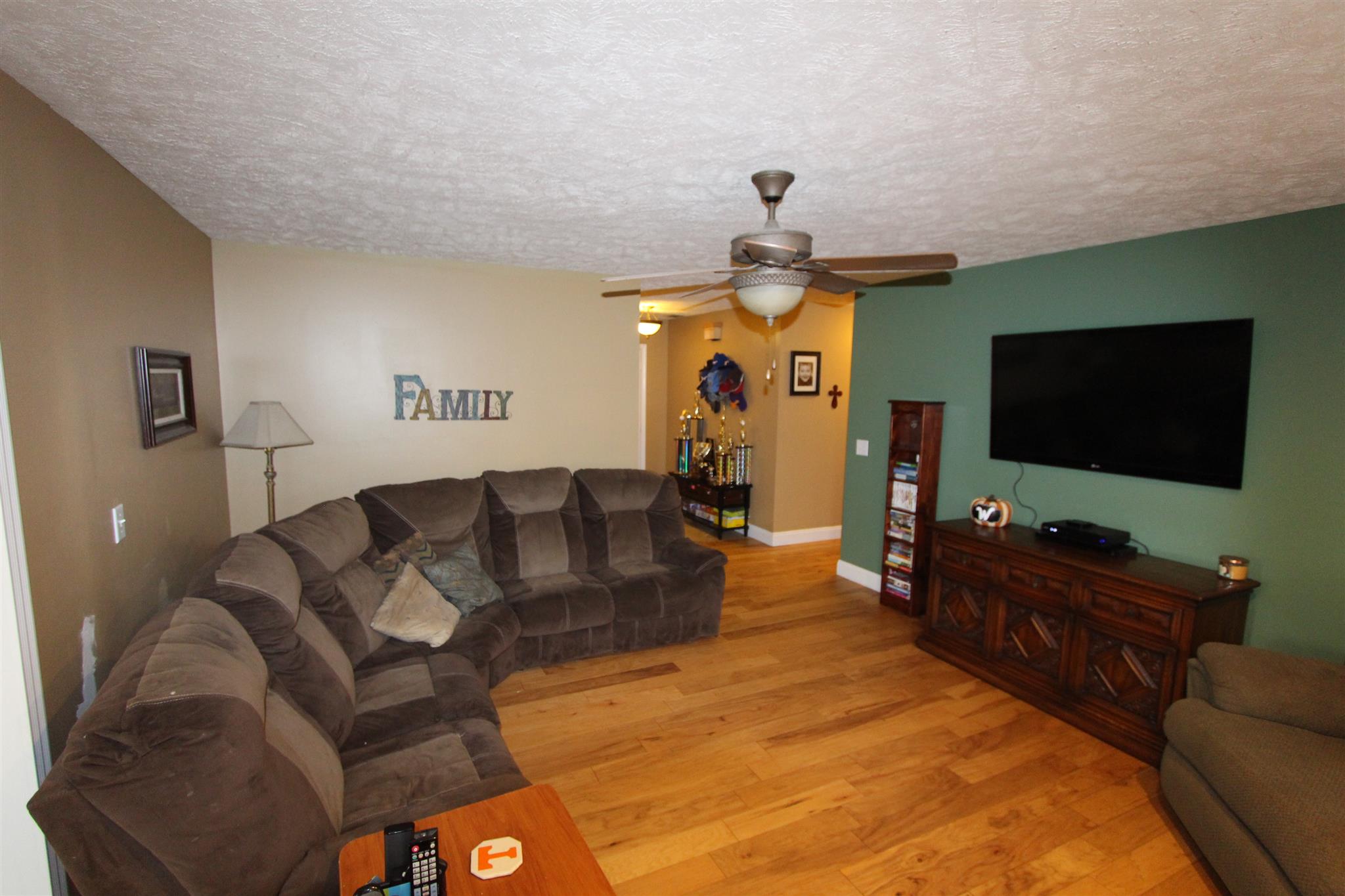 677 Crescent Road Murfreesboro, TN 37128 - Photo 4 of 15 a living room with furniture and a flat screen tv