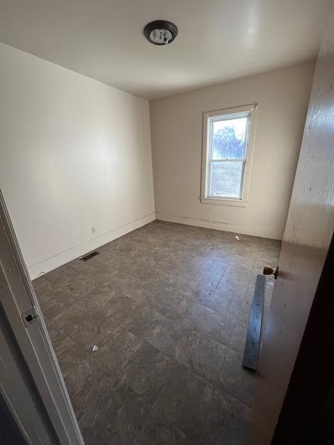 4016 Connecticut Street Gary, IN 46409 - Photo 4 of 7 an empty room with windows