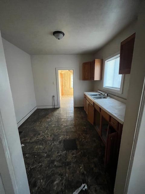 4016 Connecticut Street Gary, IN 46409 - Photo 7 of 7 a kitchen with a stove and a refrigerator