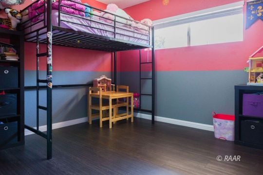 117 South Fire Opal Street Ridgecrest, CA 93555 - Photo 19 of 28 a view of a room with wooden floor