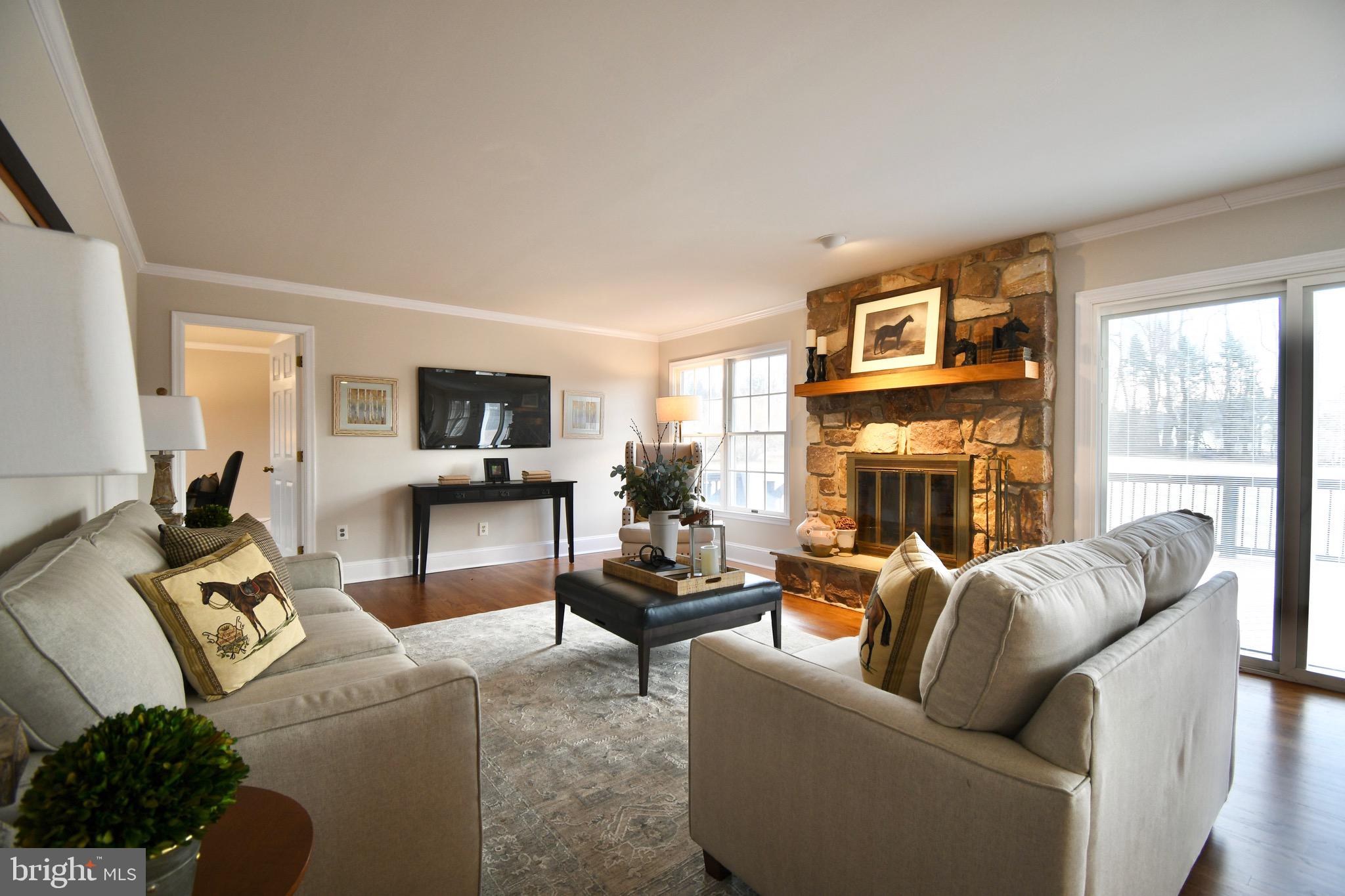 116 Three Ponds Lane Malvern, PA 19355 - Photo 15 of 40 Family Room with Wood Burning Fireplace