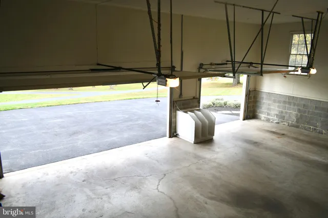 a view of a floor to ceiling window and an outdoor view