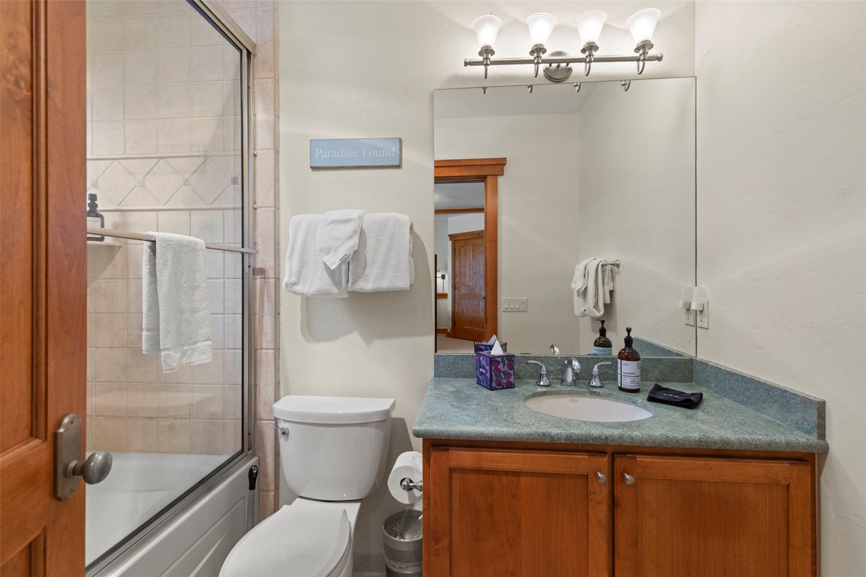 317 Timbertrail Road Breckenridge, CO 80424 - Photo 43 of 50 a bathroom with a granite countertop sink a toilet and shower