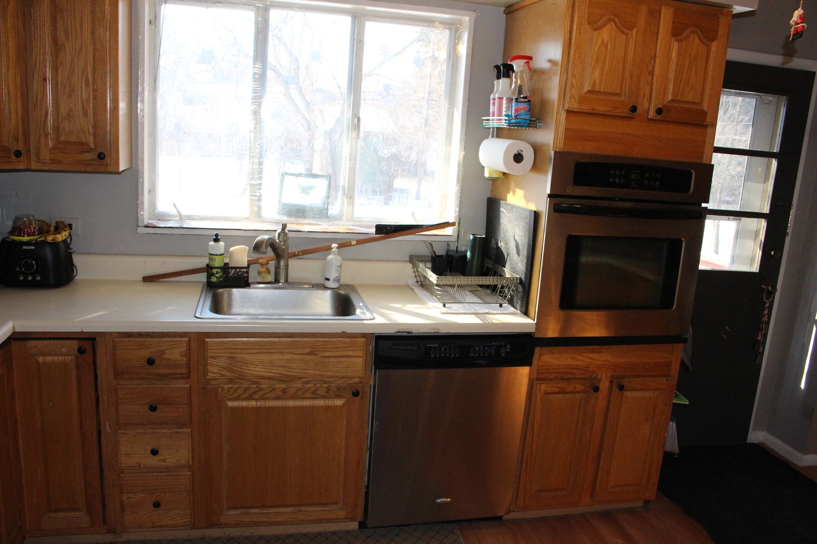 Undisclosed Address Elmhurst, IL 60126 - Photo 12 of 42 a kitchen with a sink cabinets and window