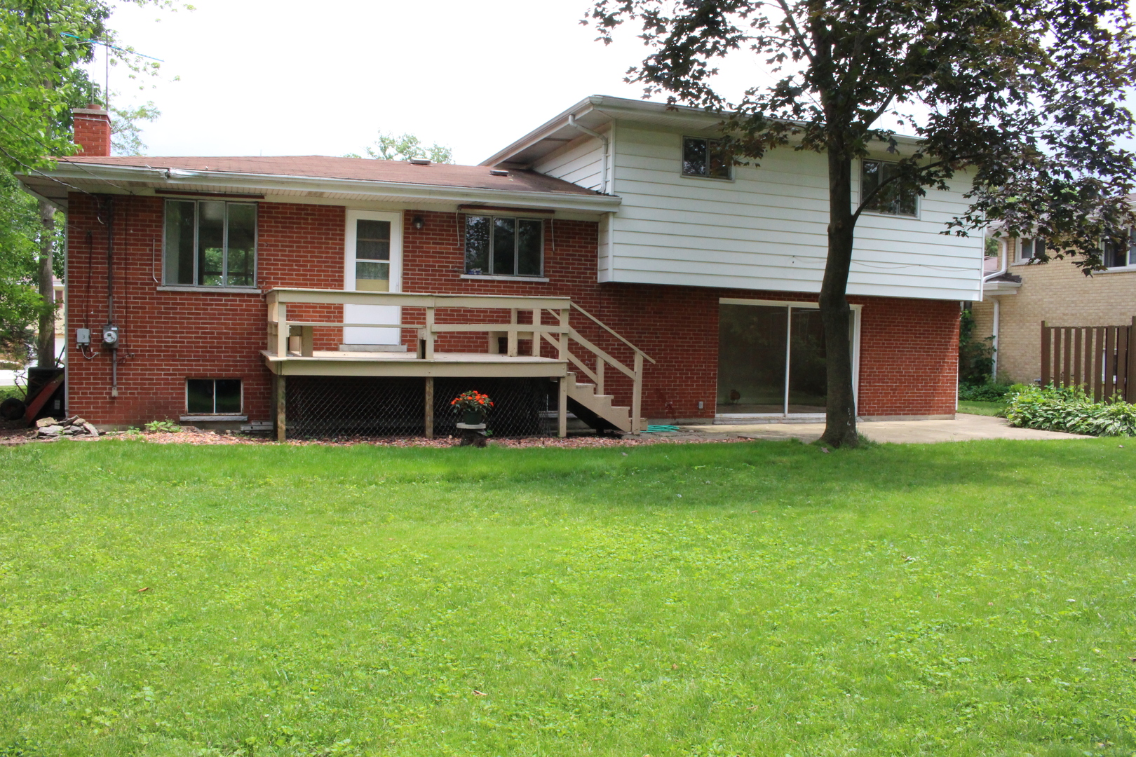 Undisclosed Address Elmhurst, IL 60126 - Photo 29 of 42 front view of a house with a yard