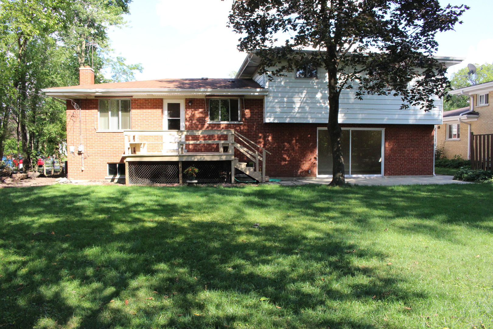 Undisclosed Address Elmhurst, IL 60126 - Photo 31 of 42 a front view of house with yard and seating area