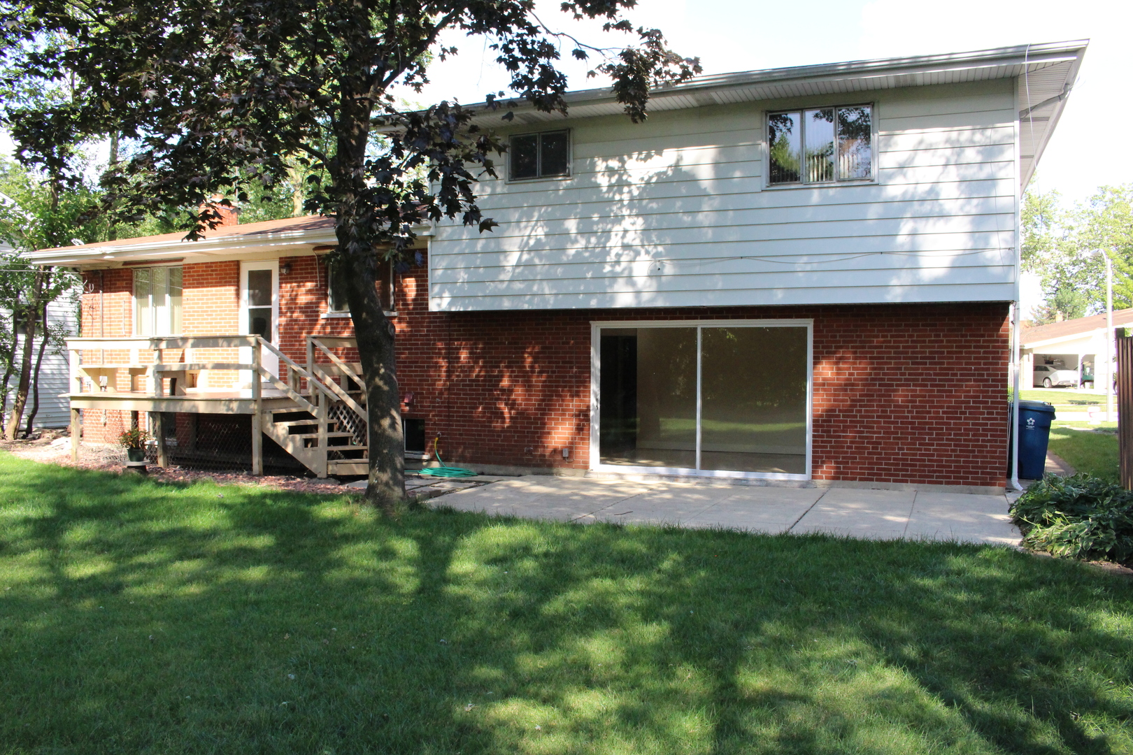Undisclosed Address Elmhurst, IL 60126 - Photo 32 of 42 a view of a house with a yard and sitting area