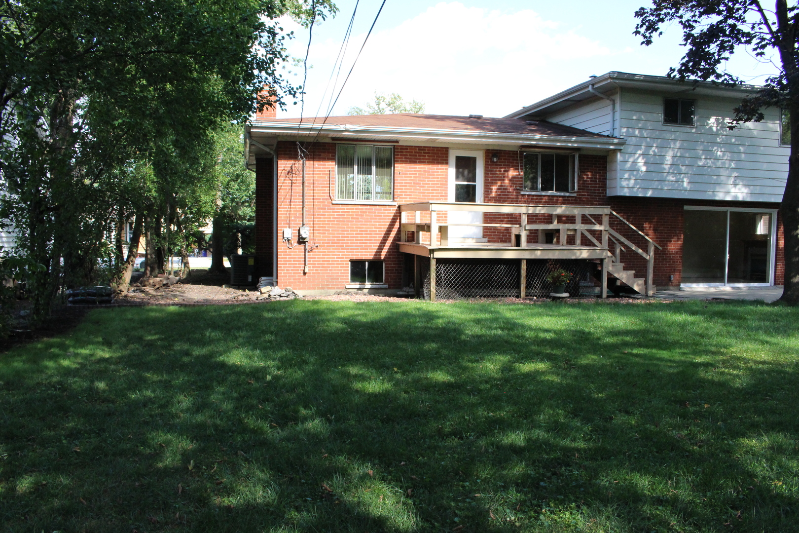 Undisclosed Address Elmhurst, IL 60126 - Photo 35 of 42 a front view of house with yard and green space