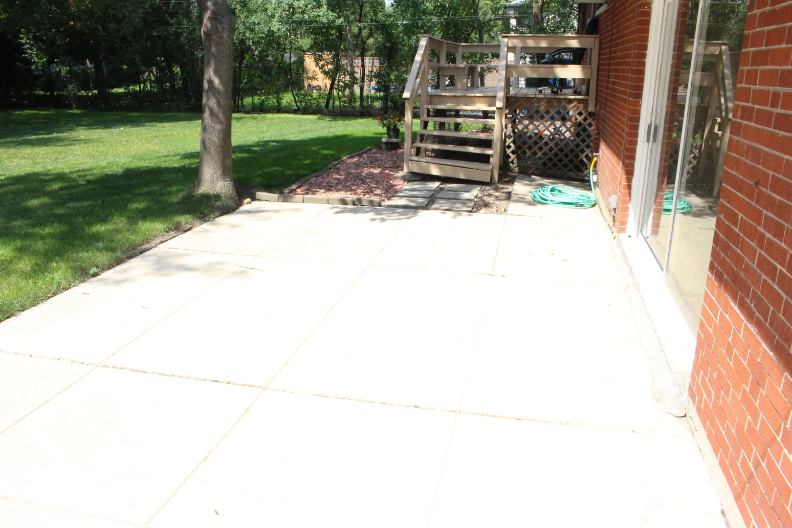 Undisclosed Address Elmhurst, IL 60126 - Photo 36 of 42 a view of a backyard with wooden fence