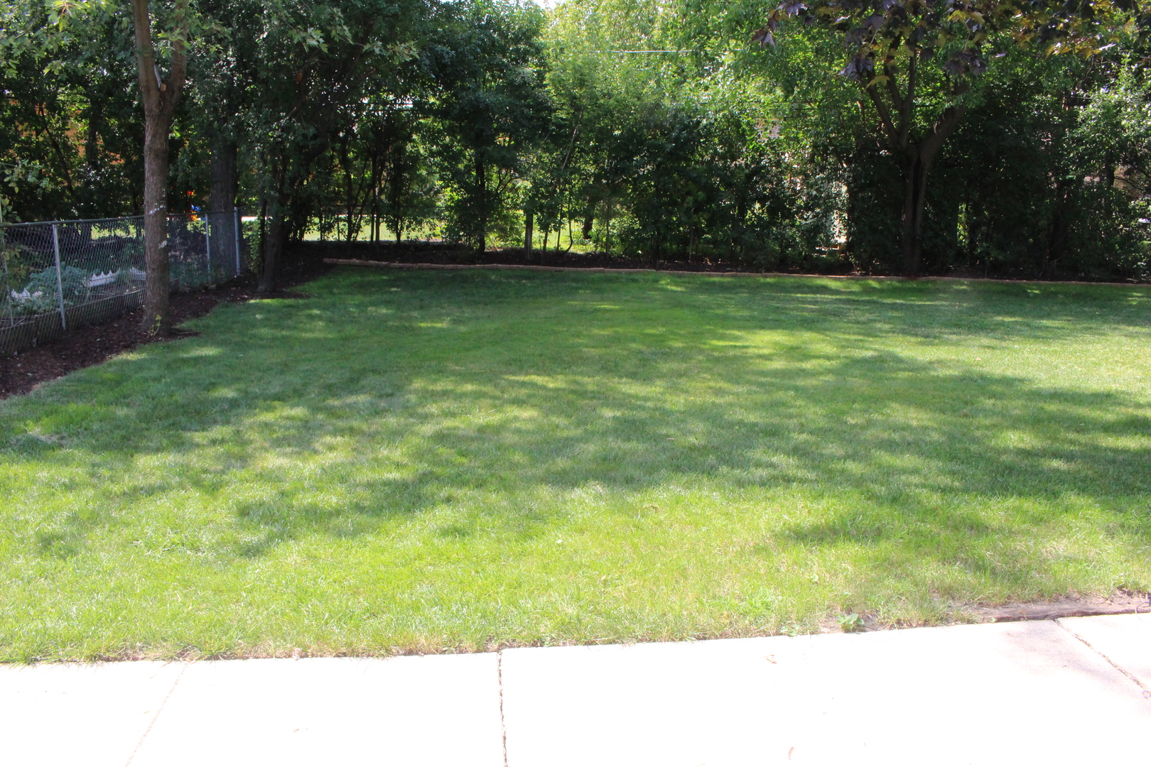 Undisclosed Address Elmhurst, IL 60126 - Photo 38 of 42 a black and white photo of a park