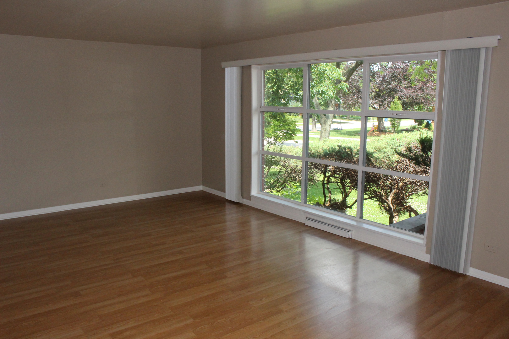 Undisclosed Address Elmhurst, IL 60126 - Photo 7 of 42 a view of room with wooden floor and doors