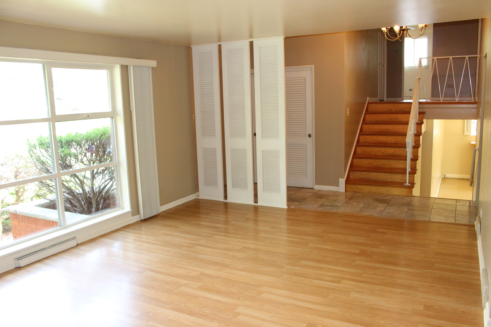 Undisclosed Address Elmhurst, IL 60126 - Photo 8 of 42 a view of entryway and hall with wooden floor