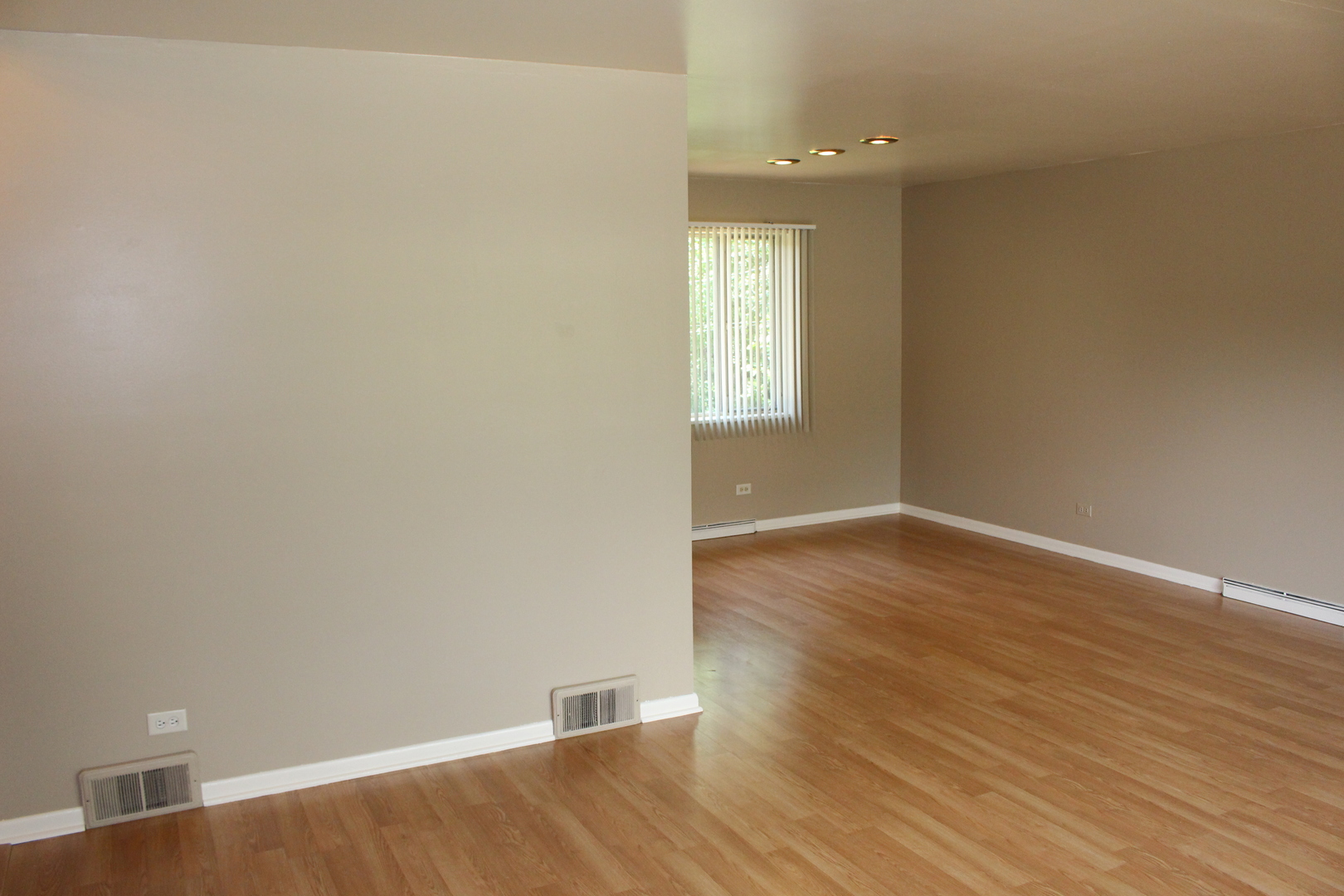 Undisclosed Address Elmhurst, IL 60126 - Photo 9 of 42 wooden floor in an empty room with a window