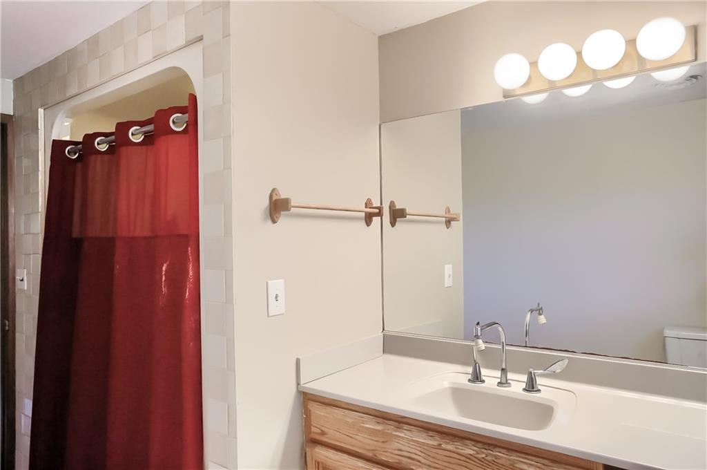 161 B Morgan Road Butler, PA 16002 - Photo 8 of 25 a bathroom with a sink and a mirror