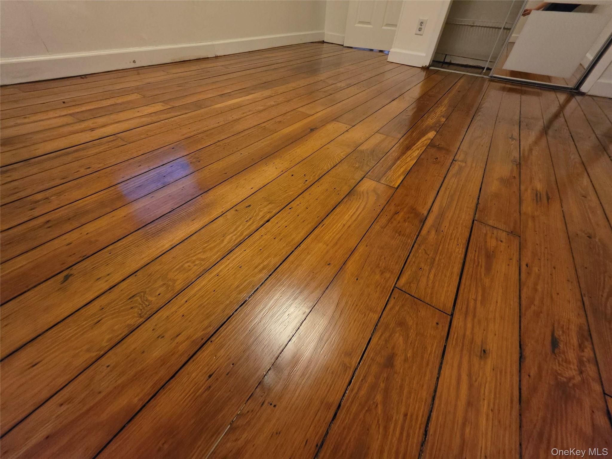 60 Main Street Tappan, NY 10983 - Photo 12 of 22 a view of a room with wooden floor