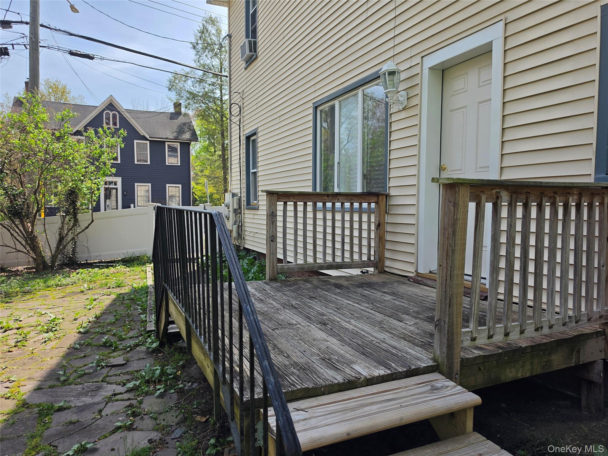 60 Main Street Tappan, NY 10983 - Photo 16 of 22 a view of a house with backyard and wooden floor