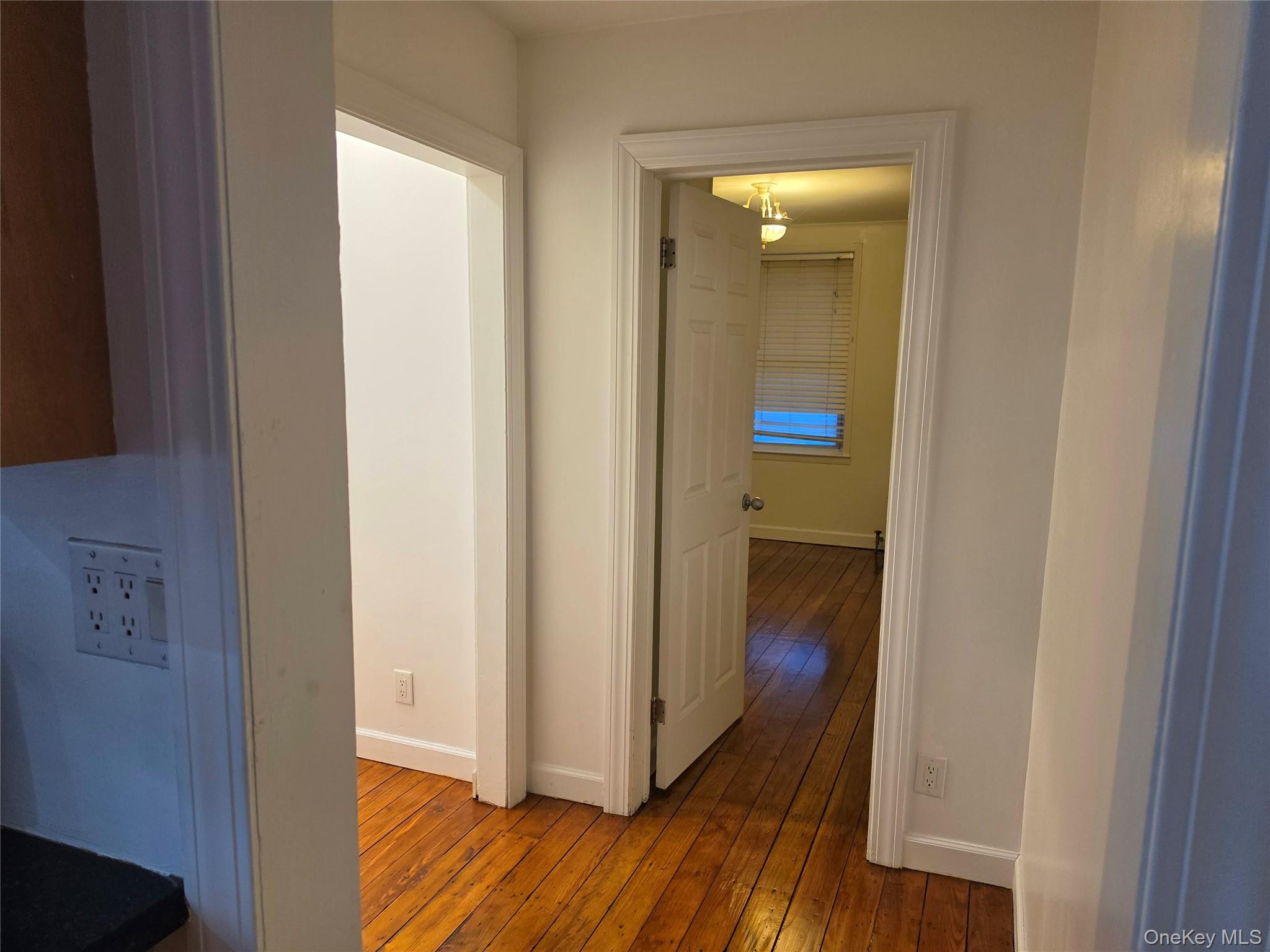 60 Main Street Tappan, NY 10983 - Photo 9 of 22 a view of a hallway with wooden floor