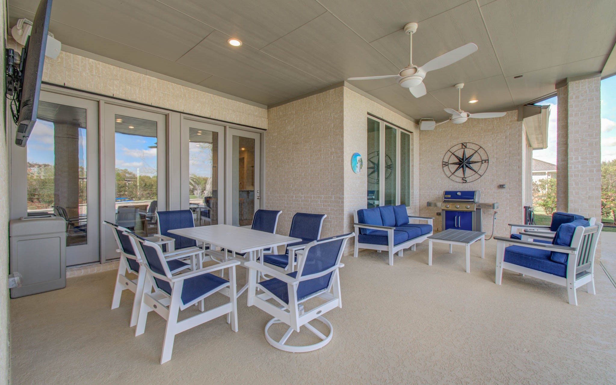 29702 Hay Field Lane Fulshear, TX 77406 - Photo 15 of 45 a dining room with furniture a chandelier and a rug