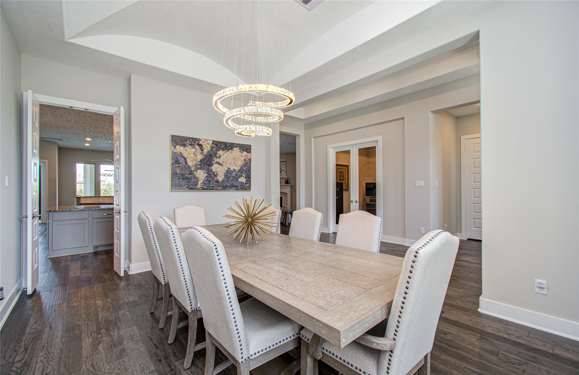 29702 Hay Field Lane Fulshear, TX 77406 - Photo 28 of 45 a view of a dining room with furniture wooden floor and chandelier