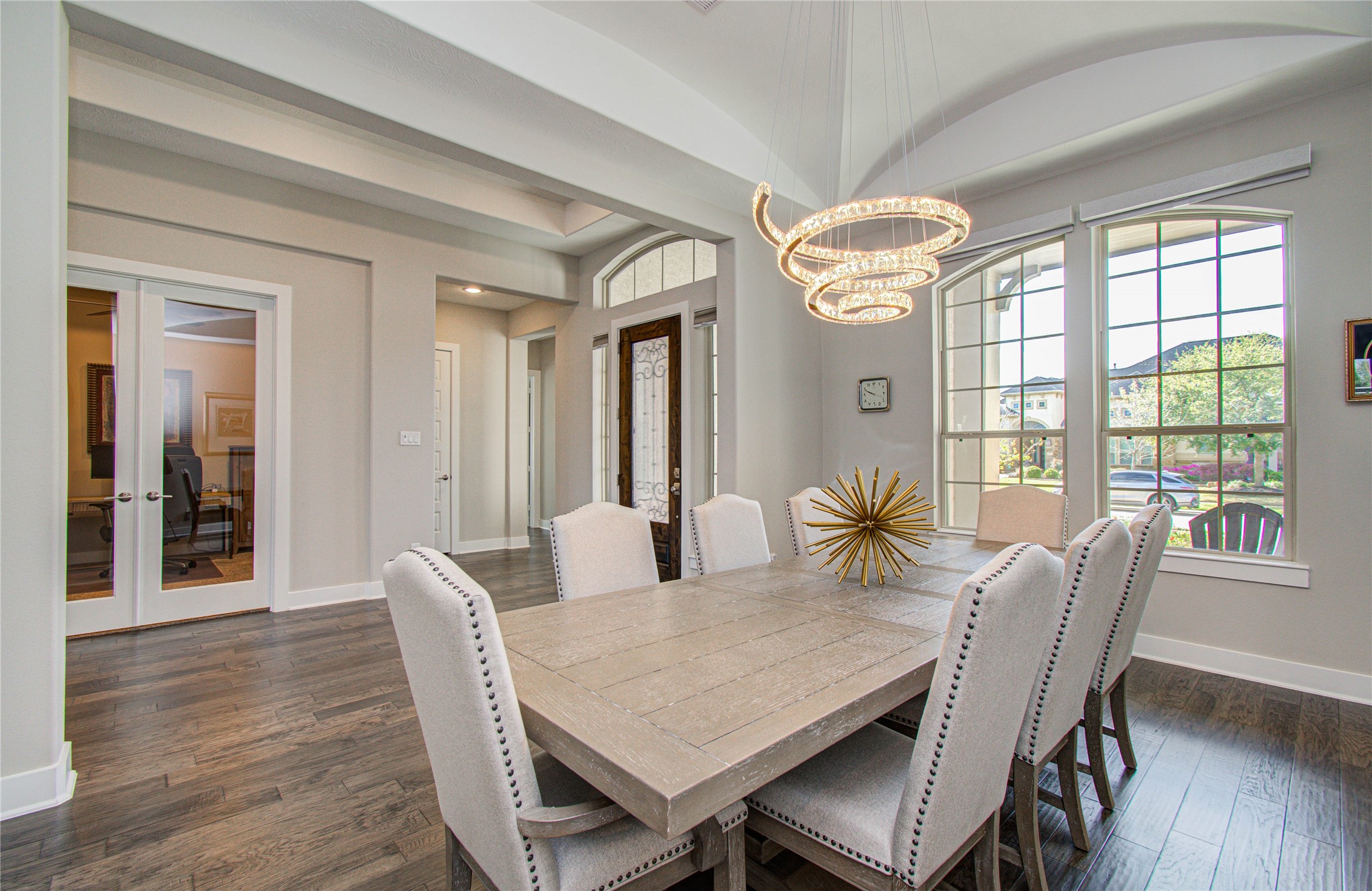 29702 Hay Field Lane Fulshear, TX 77406 - Photo 29 of 45 a view of a dining room with furniture window and wooden floor