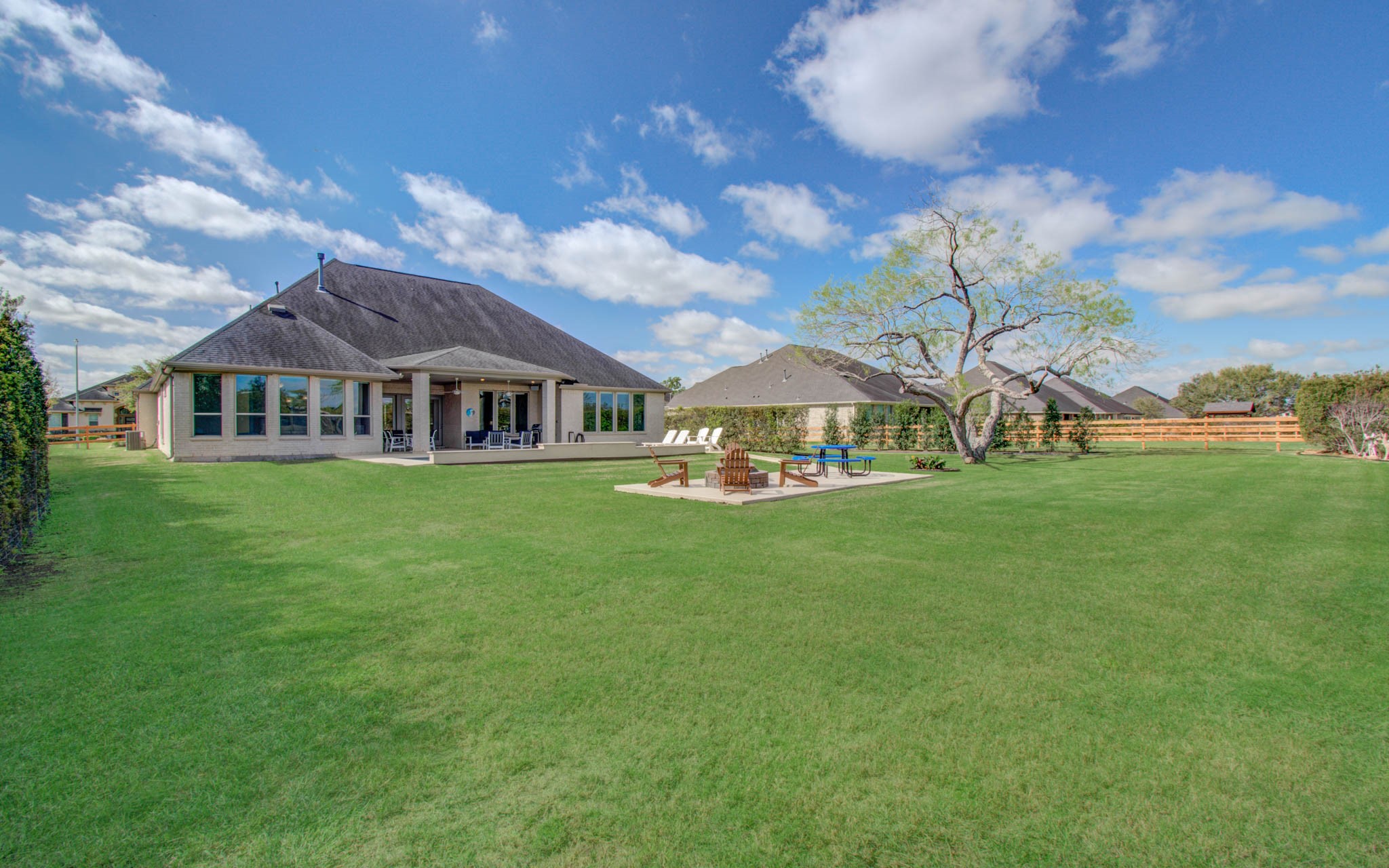 29702 Hay Field Lane Fulshear, TX 77406 - Photo 42 of 45 a view of a house with a big yard