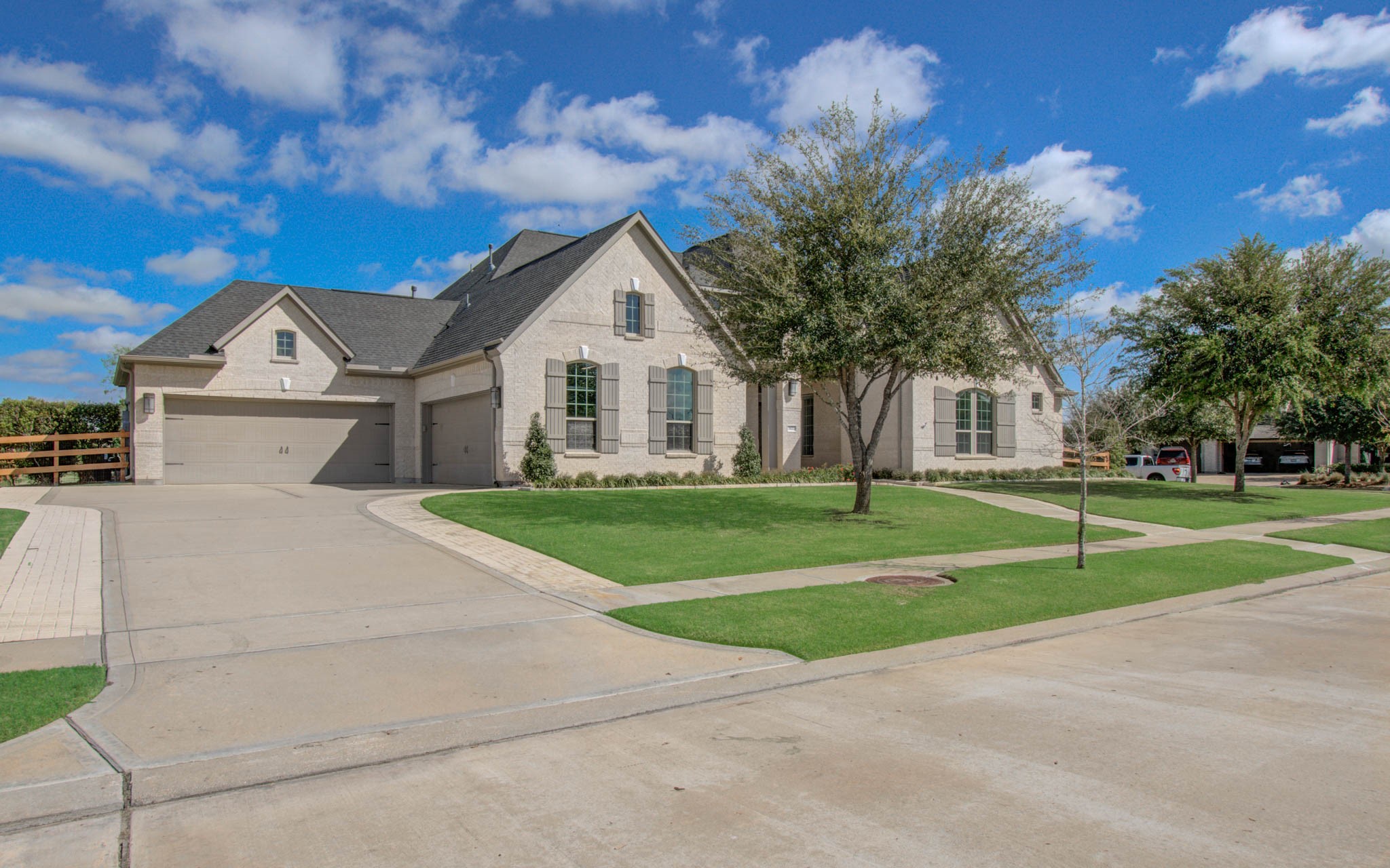 29702 Hay Field Lane Fulshear, TX 77406 - Photo 43 of 45 a front view of a house with a yard