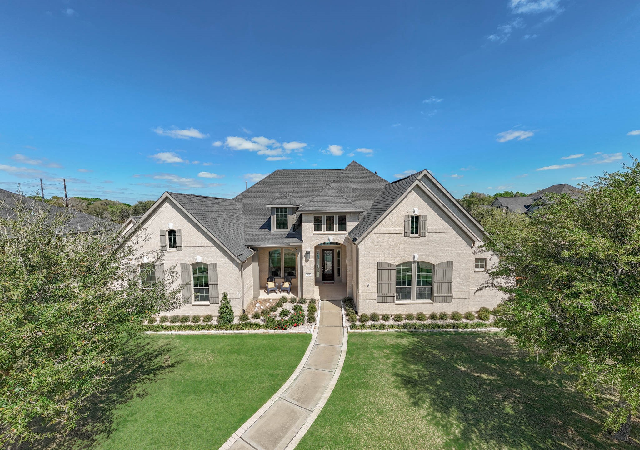 29702 Hay Field Lane Fulshear, TX 77406 - Photo 45 of 45 a front view of a house with a yard
