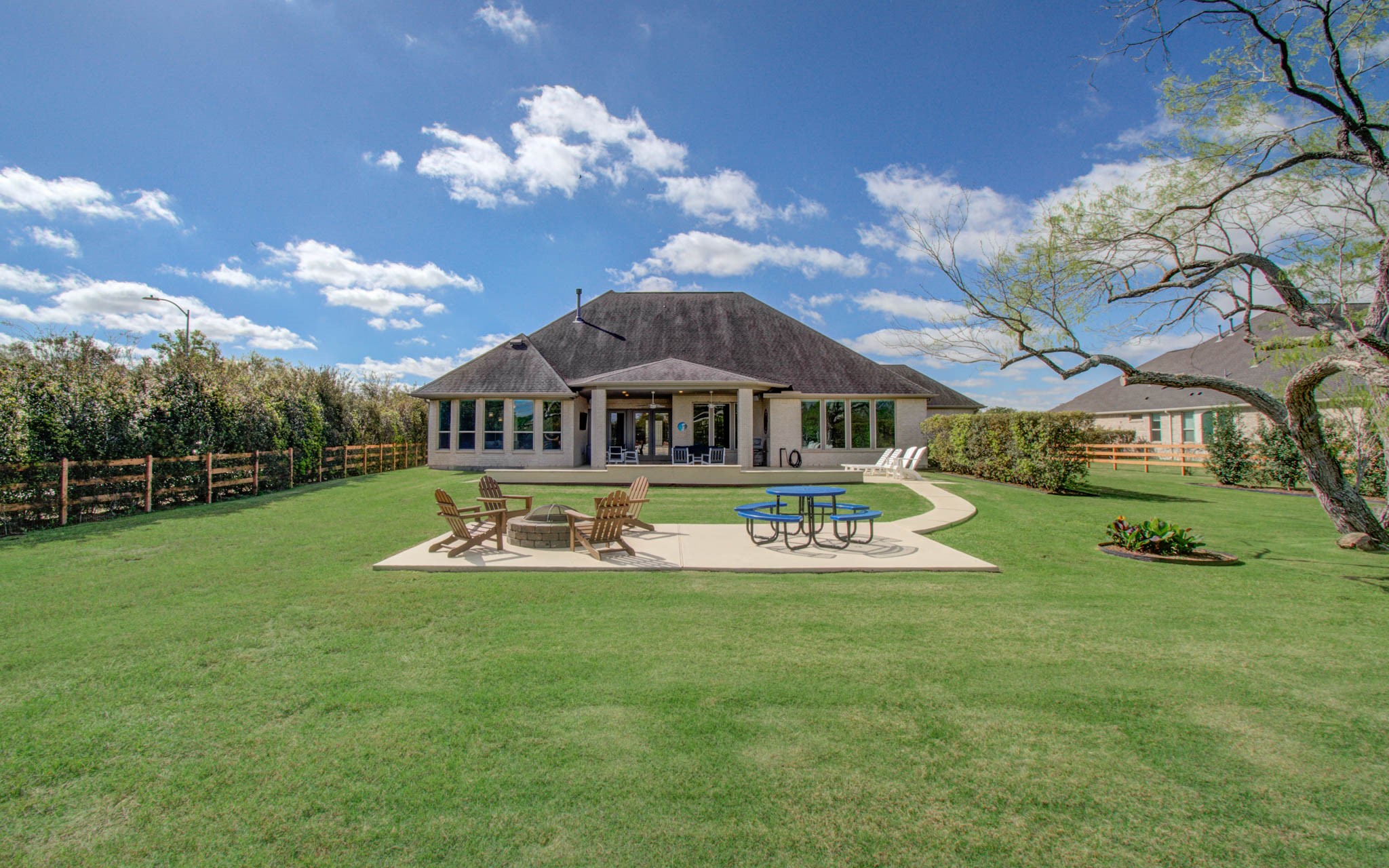 29702 Hay Field Lane Fulshear, TX 77406 - Photo 8 of 45 a view of a house with a big yard
