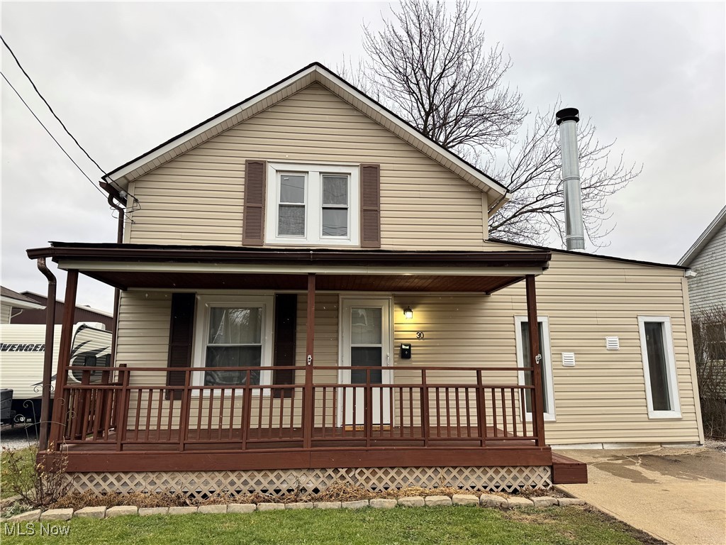 30 Medina Street Rittman, OH 44270 - Photo 1 of 28 View of front of house featuring covered porch