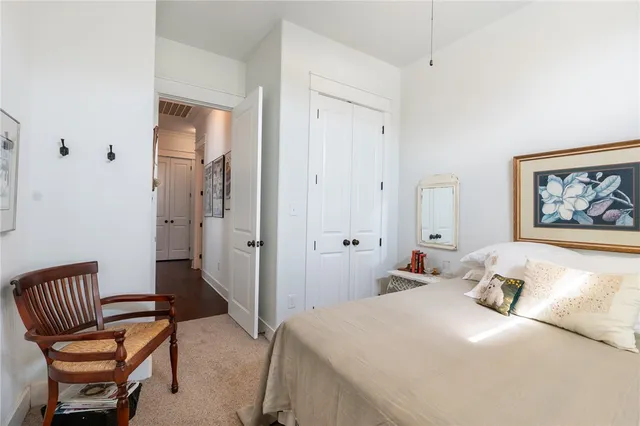 a bedroom with a bed and furniture