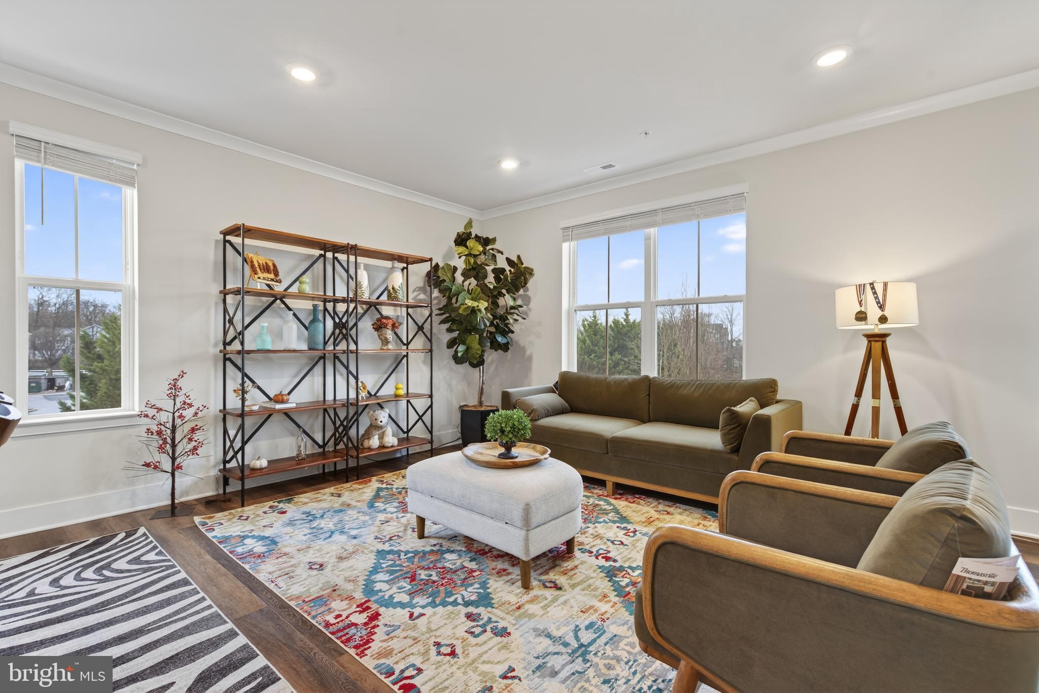 7201 Gringotts Way, Unit B Elkridge, MD 21075 - Photo 13 of 37 a living room with furniture and a wooden floor