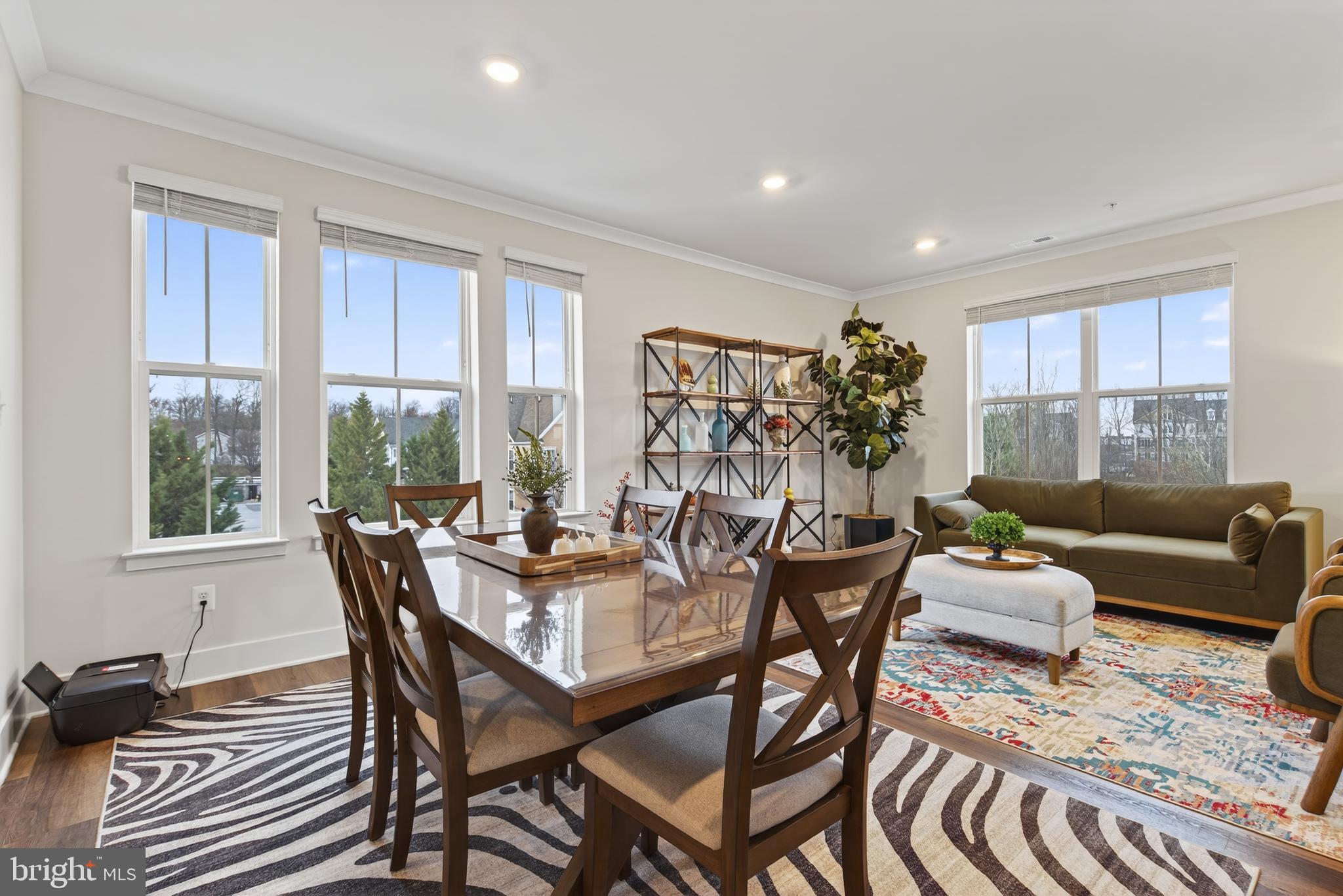7201 Gringotts Way, Unit B Elkridge, MD 21075 - Photo 14 of 37 a view of a dining room with furniture window and outside view