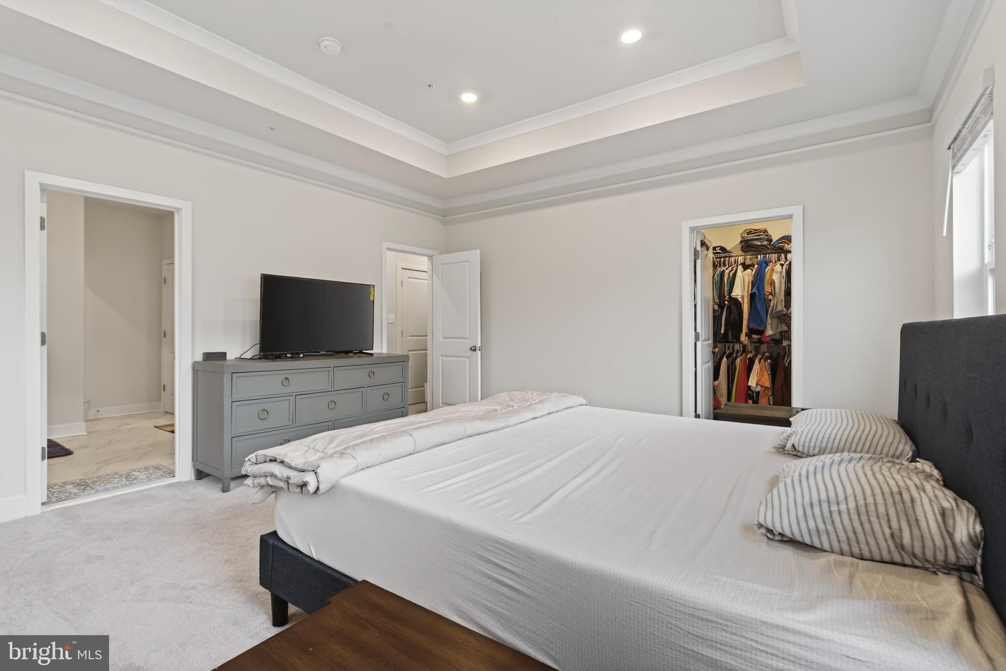 7201 Gringotts Way, Unit B Elkridge, MD 21075 - Photo 21 of 37 a bedroom with a bed and a flat screen tv