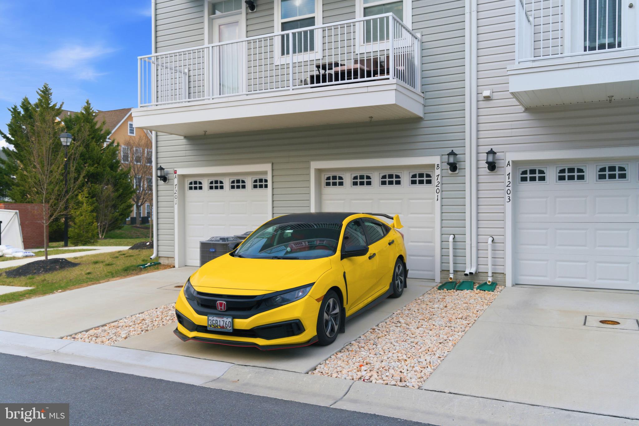 7201 Gringotts Way, Unit B Elkridge, MD 21075 - Photo 34 of 37 a view of a mini car park in front of a building