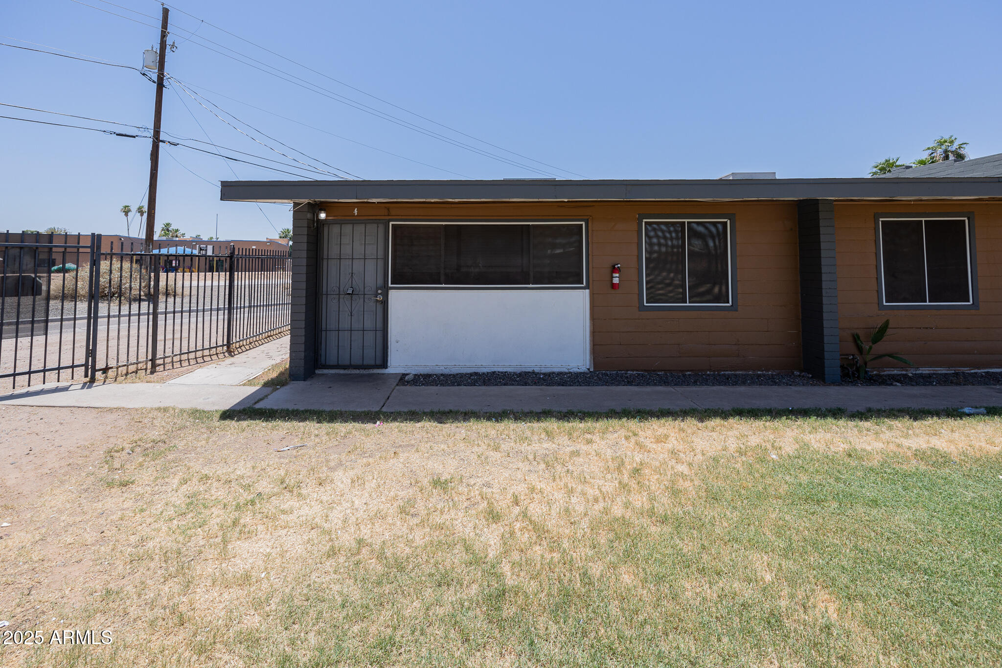 2139 West Devonshire Avenue, Unit 4 Phoenix, AZ 85015 - Photo 2 of 13 a view of a backyard