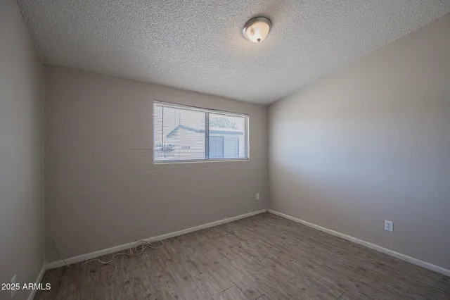 an empty room with a workspace