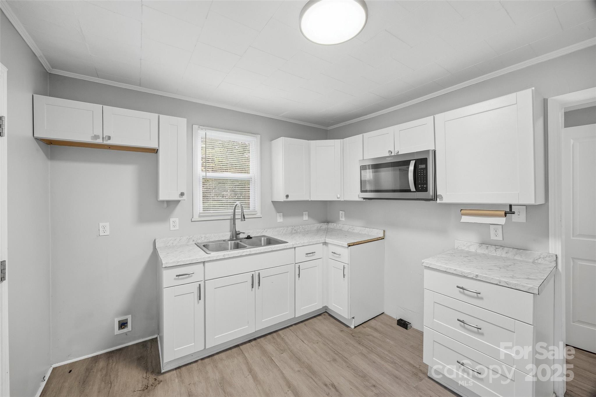 126 South Jackson Road Lancaster, SC 29720 - Photo 15 of 24 a kitchen with a sink stove and microwave