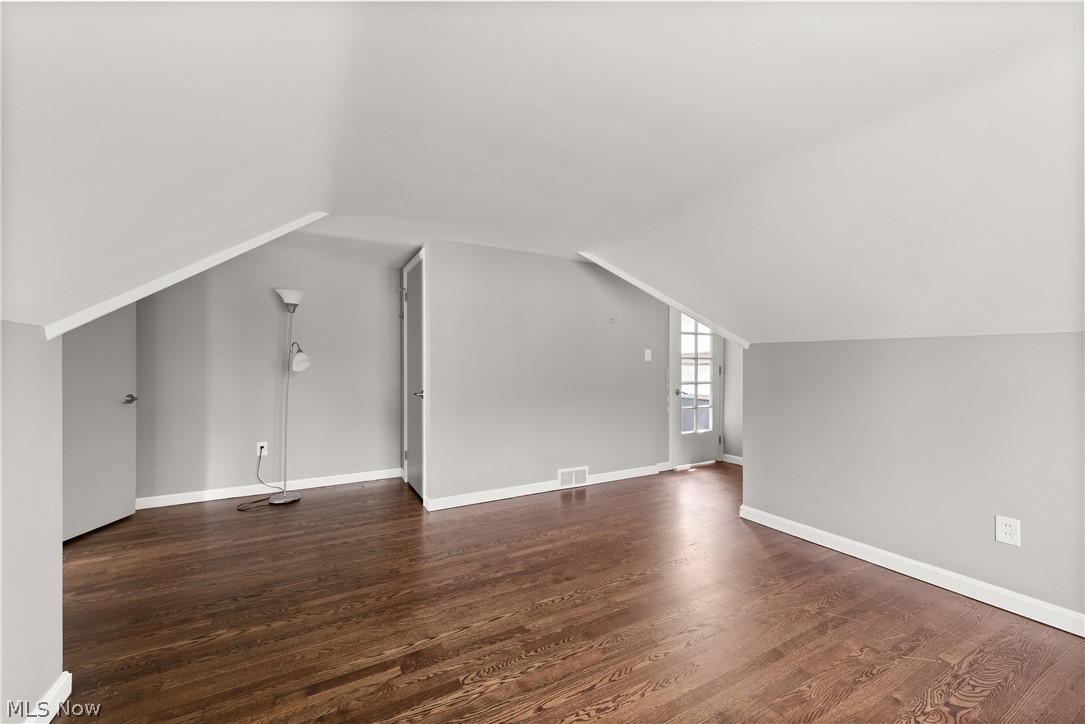 21779 Eaton Road Cleveland, OH 44126 - Photo 20 of 46 Bedroom featuring dark hardwood / wood-style floors and lofted ceiling
