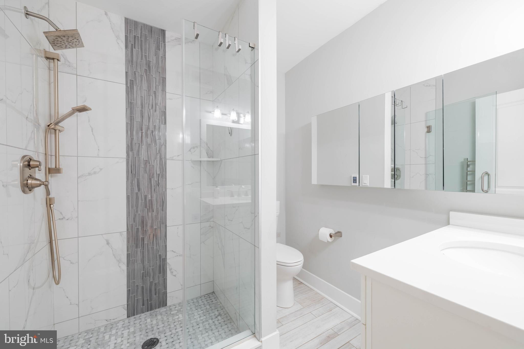 317 North Front Street Philadelphia, PA 19106 - Photo 13 of 27 a bathroom with a sink a toilet and shower