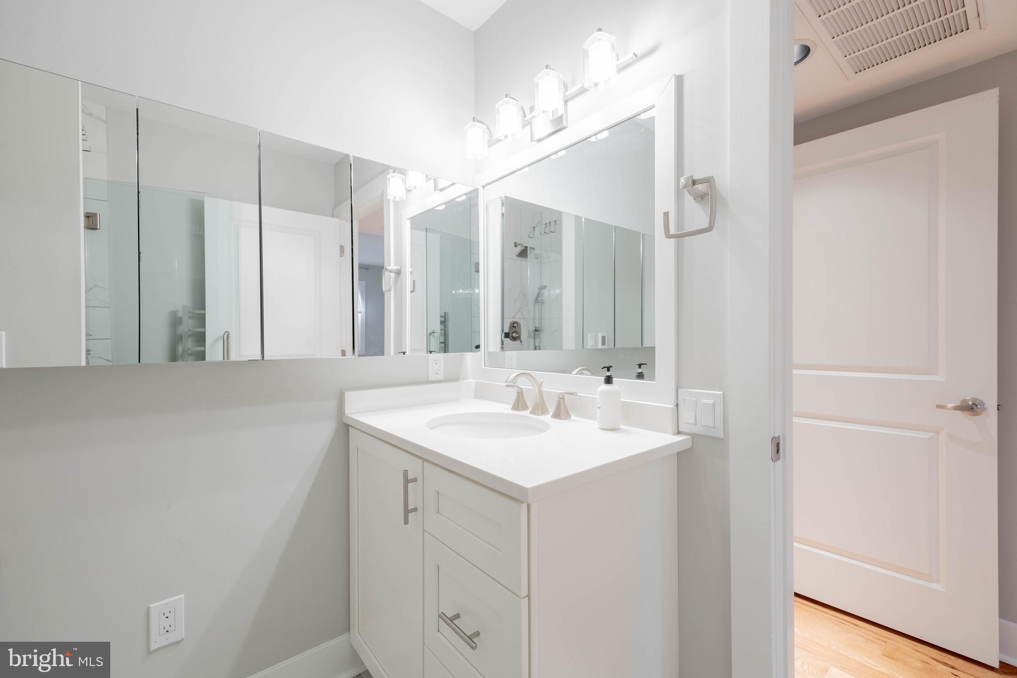 317 North Front Street Philadelphia, PA 19106 - Photo 14 of 27 a bathroom with a sink and a mirror